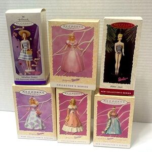 Six Hallmark Barbie’s ornaments
